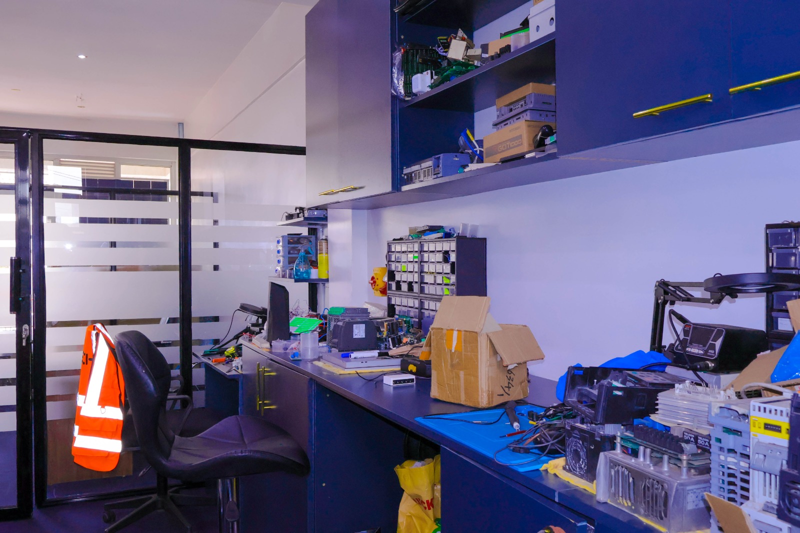 DAIL and Kenyatta University Engineering Researchers collaborating at the Destiny Aerospace Industries Limited Lab during Hardware-in-the-Loop mission simulation and robotics development.